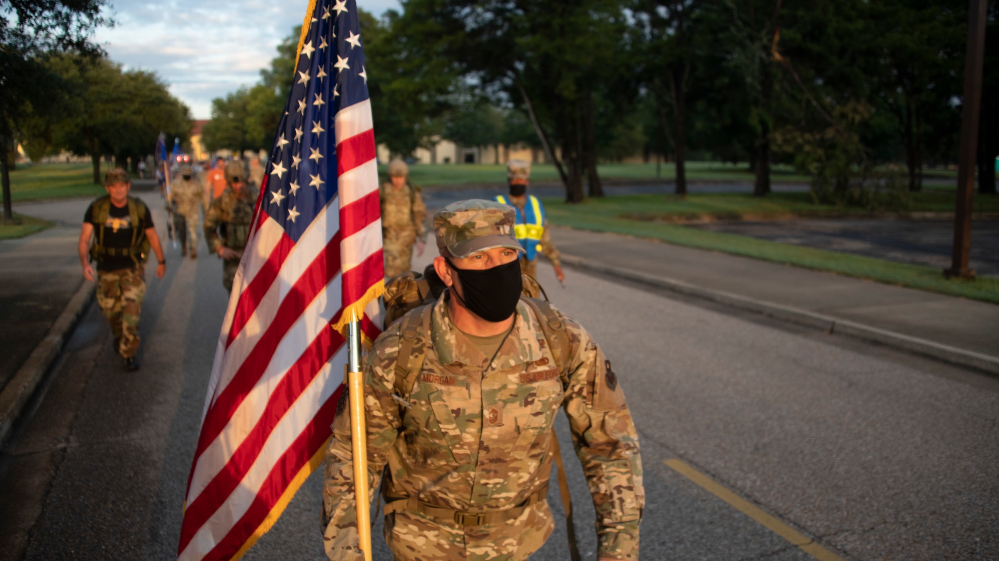 Chief Master Sgt. Michael Morgan, 42nd Air Base Wing command chief, leads Airmen on a ruck march in remembrance of 9/11, Sept. 11, 2020, on Maxwell Air Force Base, Alabama. The ruck march was 2.72 miles and included multiple stops around base. (U.S. Air Force photo by Airman 1st Class Jackson Manske)