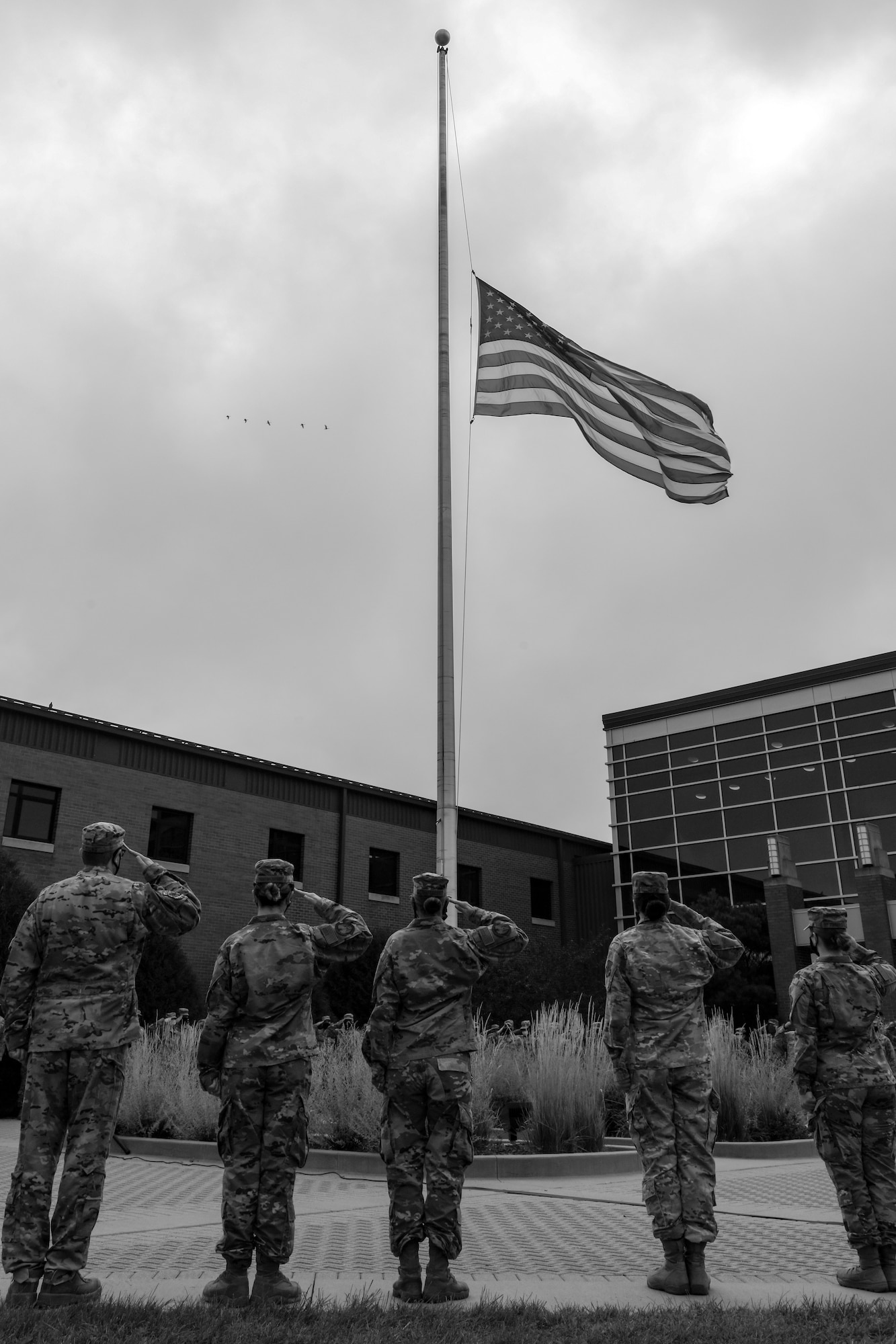 Reserve Citizen Airmen of the 910th Airlift Wing salute the American flag during the playing of taps, Sept. 11, 2020, for Youngstown Air Reserve Station’s 9/11 remembrance ceremony. The installation has held a ceremony every year to honor those who lost their lives in terrorist attacks on Sept. 11, 2001.