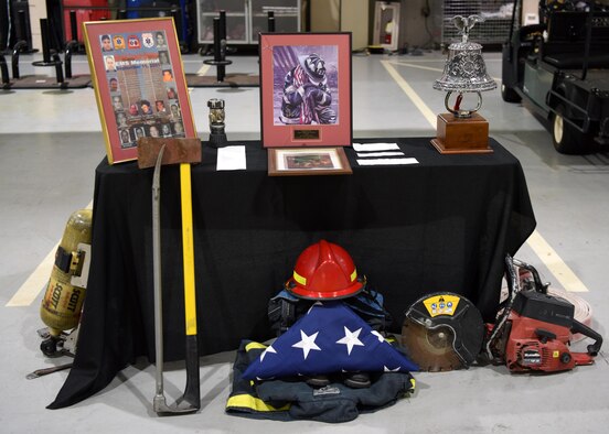 A 312th Training Squadron instructor rings the bell five times during the 9/11 ceremony at the Louis F. Garland Department of Defense Fire Academy on Goodfellow Air Force Base, Texas, September 11, 2020. Each tone was dedicated to those who died during the attacks on 9/11. (U.S. Air Force photo by Airman 1st Class Ethan Sherwood)