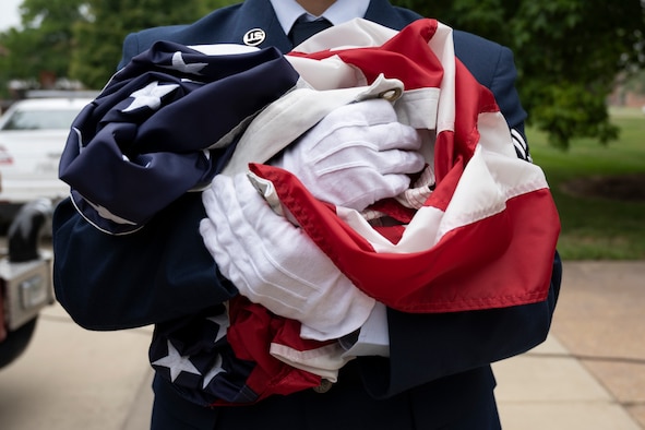 Airman holds U.S. Flag