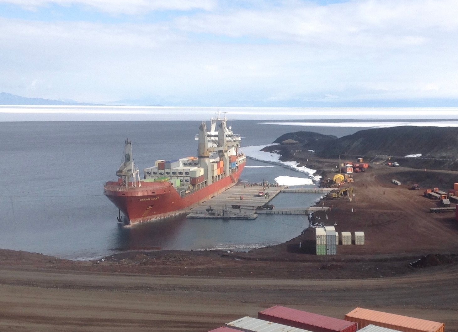 Military Sealift Command-chartered container ship MV Ocean Giant conducts  cargo offloads at McMurdo Station, Antarctica.  The operation is part of MSC’s annual resupply mission in support of Operation Deep Freeze, the Joint Task Force Support for Antarctica mission to resupply the remote scientific outpost.