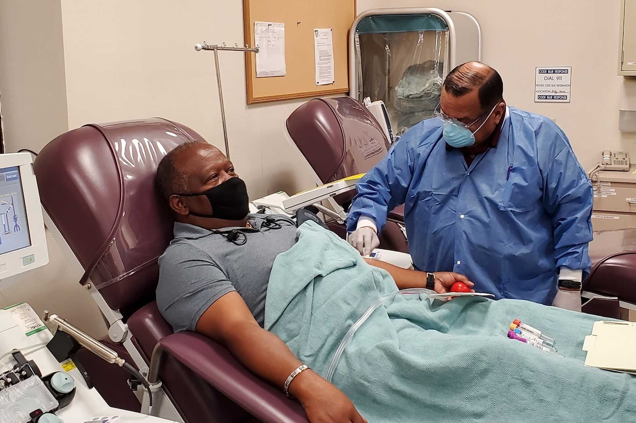 A donor being prepared to donate blood.