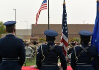 photo of three Air Force Honor Guard members watching a  9/11 remembrance ceremony at Davis-Monthan Air Force Base, Arizona