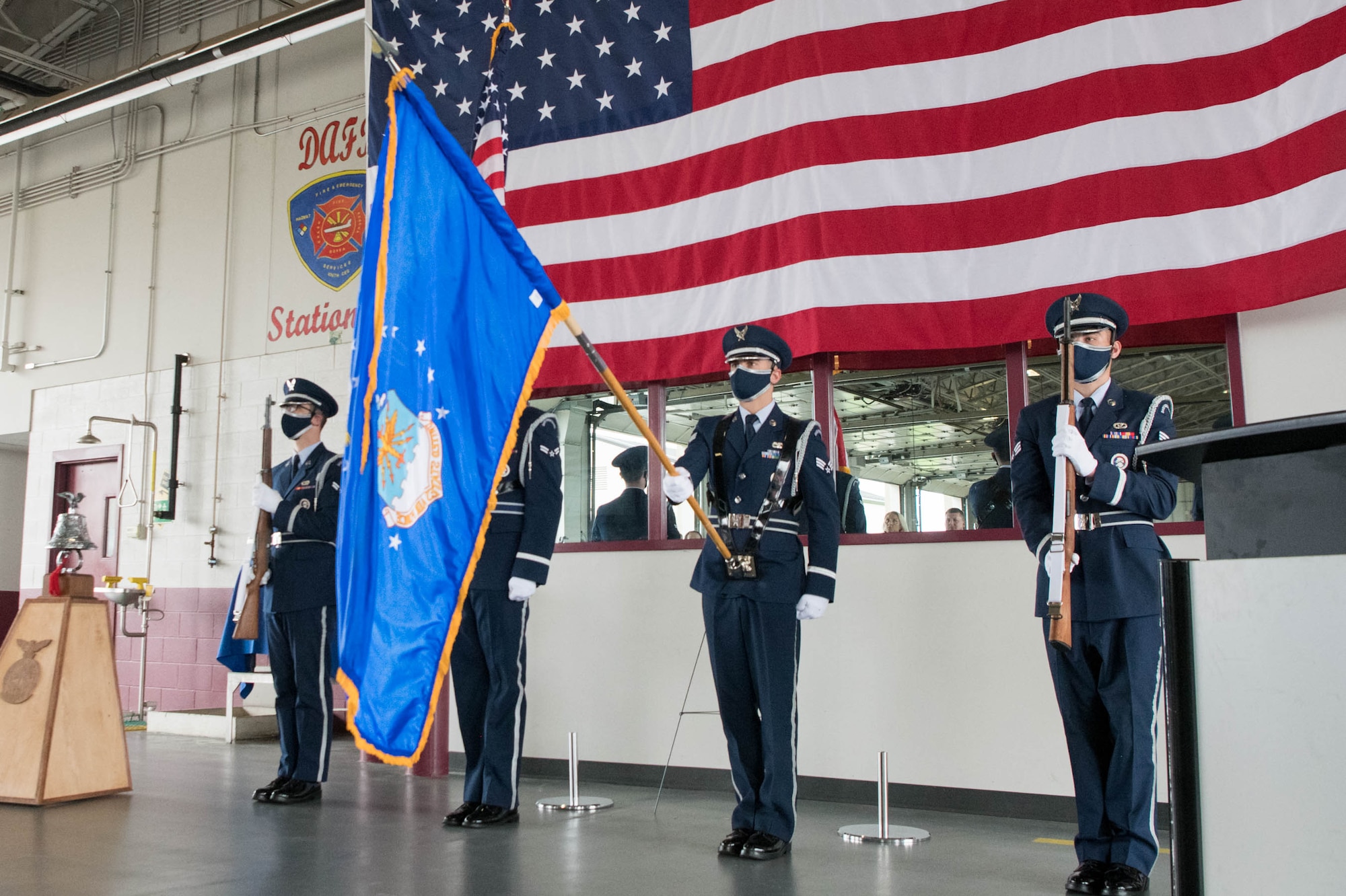 Members of the Dover Air Force Base Honor Guard present the colors during the 19th Anniversary 9/11 memorial eventSept. 11, 2020, at Dover AFB, Delaware. The memorial event honored the civilian casualties of the terrorist attacks, as well as the police officers, firefighters and first responders who lost their lives attempting to save them. (U.S. Air Force photo by Mauricio Campino)