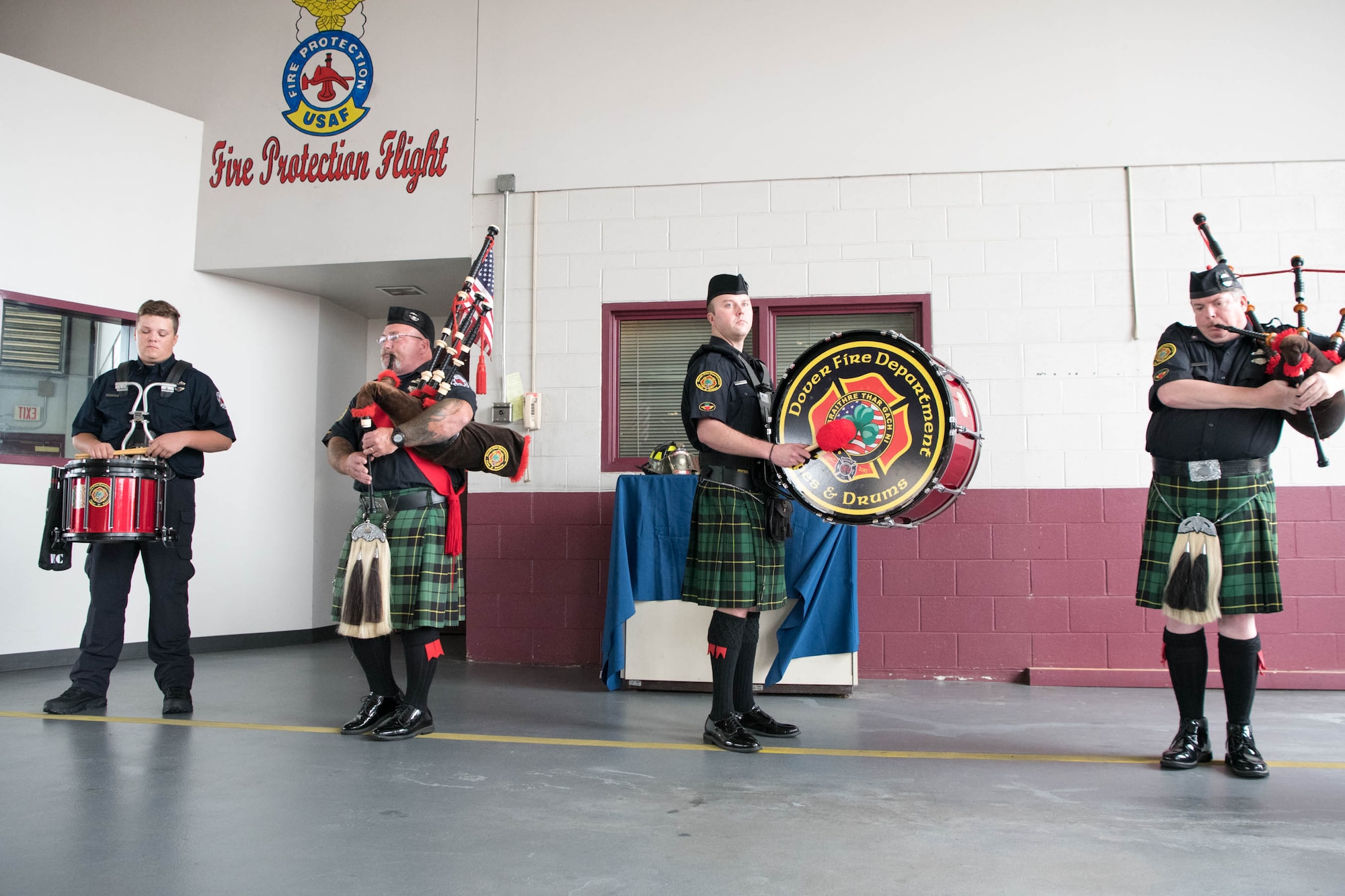 Dover Police and Fire Pipes and Drums, play “Amazing Grace” at the conclusion of the 19th Anniversary 9/11 memorial eventSept. 11, 2020, at Dover Air Force Base, Delaware. Members of The Dover Police and Fire Pipes and Drums are all volunteers and participate in various community, civic and military functions to honor retired and active police officers, firefighters and those who have lost their lives in the line of duty. (U.S. Air Force photo by Mauricio Campino)