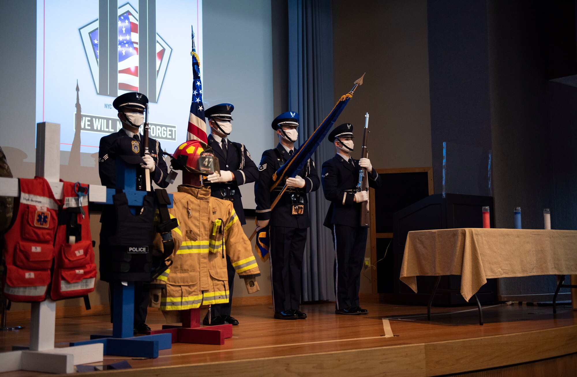 The 47th Flying Training Wing Honor Guard presents the U.S. and Air Force flags for the 9/11 Remembrance Ceremony on Sept. 11, 2020 at Laughlin Air Force Base, Texas. Their performance helped those present and those watching the livestream recognize all who gave their lives that day.