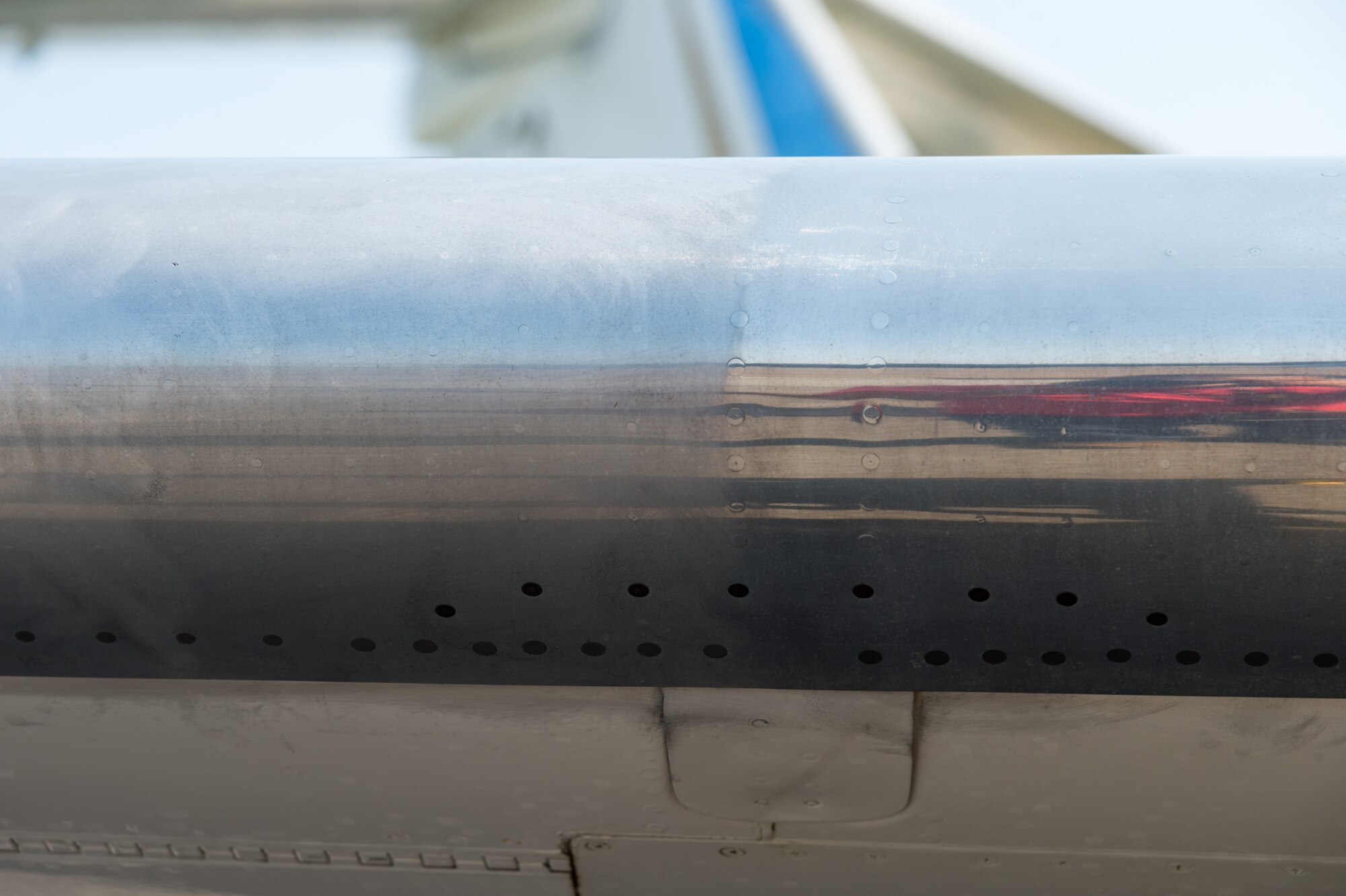 The leading edge on the right wing of the Air Force Two, a McDonnell Douglas VC-9C, shows cleaning compound applied on the left side Aug. 25, 2020, at Air Mobility Command Museum on Dover Air Force Base, Delaware. Eleven volunteers from the 436th Maintenance Squadron aircraft hydraulic section, stripped, cleaned and polished the shiny aluminum skin of the aircraft. (U.S. Air Force photo by Roland Balik)