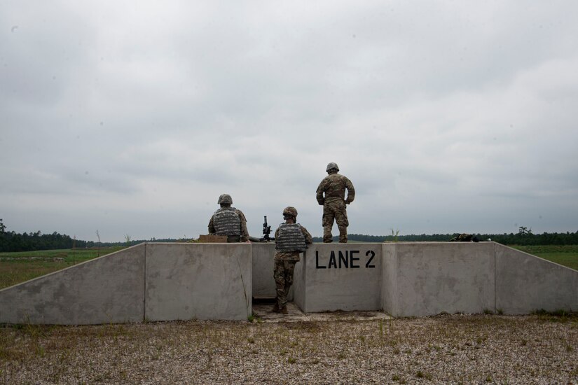 Photo of soldiers standing on a range.