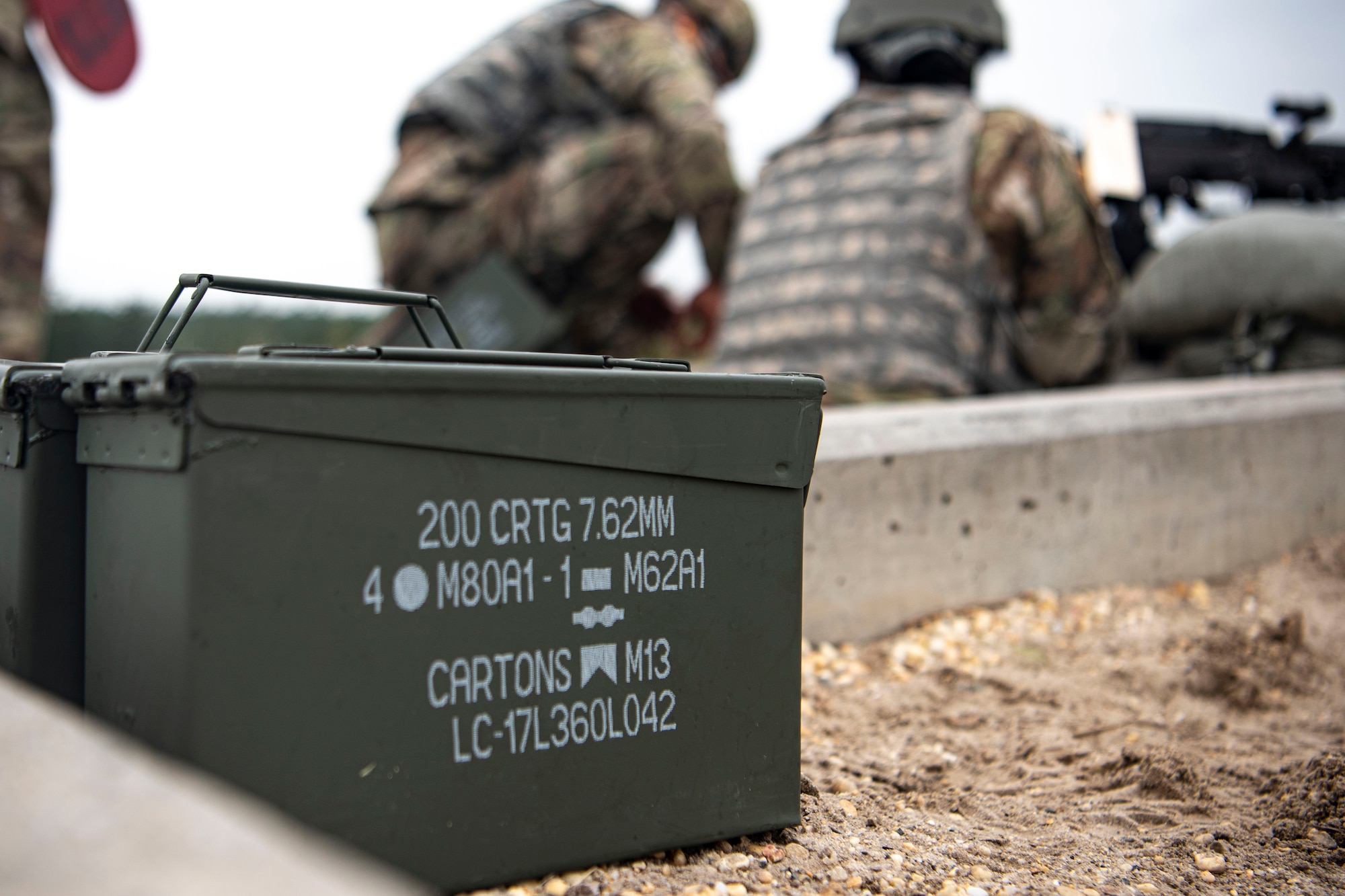 Photo of ammunition resting on the ground.
