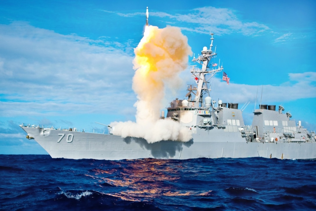 A ship deploys a missile.