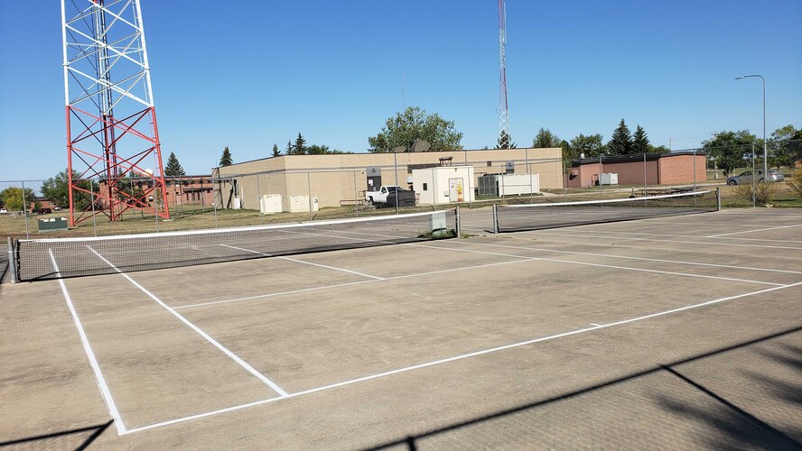 New nets and paint on tennis courts at Minot Air Force Base North Dakota.  5th Civil Engineering Squadron contracted a new painting of the lines and replaced the tennis nets in August, 2020. (U.S. Air Force photo by Staff Sgt. Steven Adkins)
