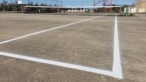 Newly painted tennis court with a new net at Minot Air Force Base North Dakota.  5th Civil Engineering Squadron contracted a new painting of the lines and replaced the tennis nets in August, 2020. (U.S. Air Force photo by Staff Sgt. Steven Adkins)