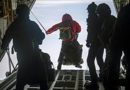 Members of the 212th Rescue Squadron, pararescuemen, combat rescue officers, and Survival, Evasion, Resistance and Escape specialists jump out of a HC-130J Combat King II assigned to the 211th Rescue Squadron in response to a simulated alert rescue call at Deadhorse, Alaska, in support of exercise Arctic Eagle 2020, Feb. 25, 2020. The Alaska National Guard is hosting exercise Arctic Eagle 2020, a joint-training exercise, Feb. 20 to March 6, 2020 throughout Alaska, including Joint Base Elmendorf-Richardson, Eielson Air Force Base, Fort Wainwright, the Yukon-Kuskokwim Delta and as far north as Teshekpuk Lake. As a homeland security and emergency response exercise, Arctic Eagle 20 is designed to increase the National Guard’s ability and effectiveness to operate in the extreme cold-weather conditions found in Arctic environments. (U.S. Air Force photo by Senior Airman Xavier Navarro)