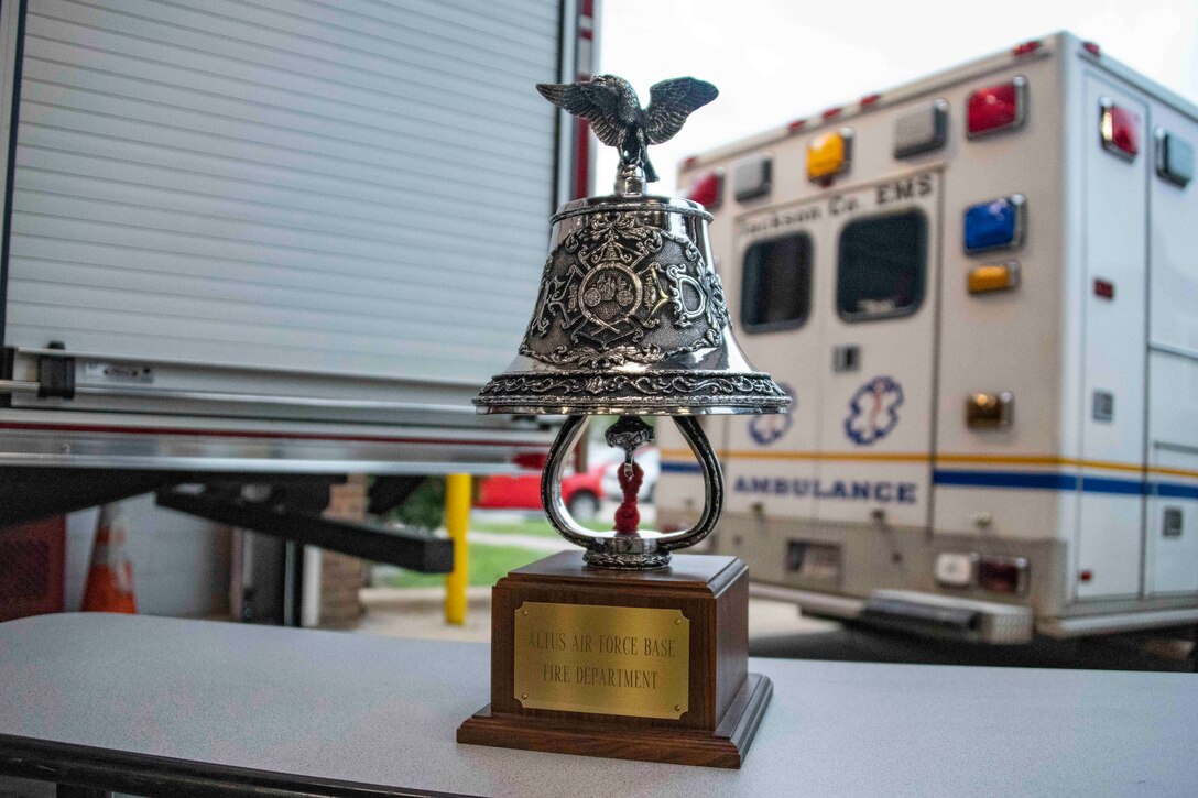 man stands in front of a backdrop