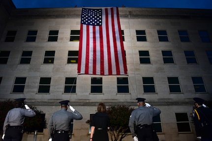 People salute flag.