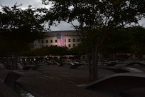 A flag hangs from the side of the Pentagon.