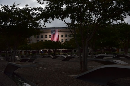 A flag hangs from the side of the Pentagon.