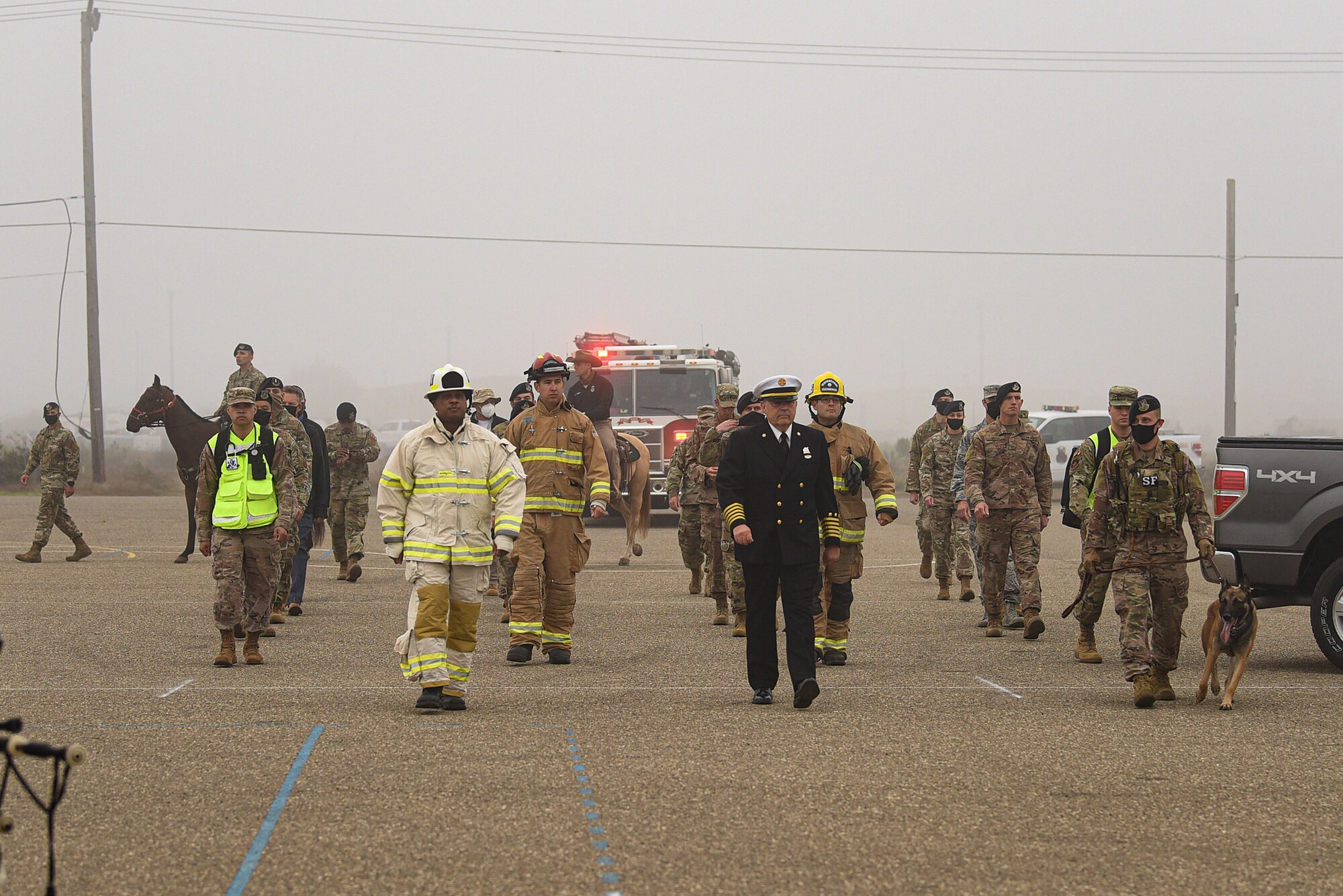 Vandenberg Air Force Base first responders participate in a silent march on their way to the annual 9/11 Remembrance Ceremony Sept. 11, 2020, at Vandenberg AFB, Calif. After the march, attendees and first responders gathered to remember and honor those who lost their life during the terrorist attacks against the United States on Sept. 11, 2001. The attacks killed roughly 3,000 people, including citizens from over 78 countries. (U.S. Air Force photo by Senior Airman Hanah Abercrombie)