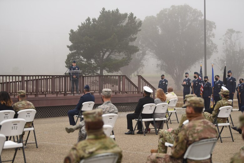 Vandenberg Air Force Base members listen to speeches given during the annual 9/11 Remembrance Ceremony Sept. 11, 2020, at Vandenberg AFB, Calif.  The speeches honored first responders and citizens who lost their lives in the terrorist attacks in New York City, New York, at the Pentagon and Pennsylvania on Sept. 11, 2001. The ceremony also featured a bell ringing, silent marc and an honor guard. (U.S. Air Force photo by Senior Airman Hanah Abercrombie)