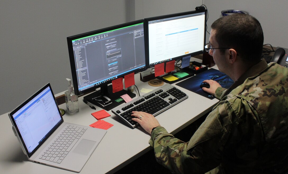 Tech. Sgt. Matthew Goff, NCOIC of Administration at OSI Det. 813, Minot Air Force Base, N.D., works the computer generated program designed to teach his robot/Artificial Intelligence (AI) to follow a set of programed actions to complete a specified task. As the user/developer, Sergeant Goff has to “teach” each step of the process, and what to do if the robot/AI encounters an error. (Photo by SA Eric Little/OSI Det. 813)