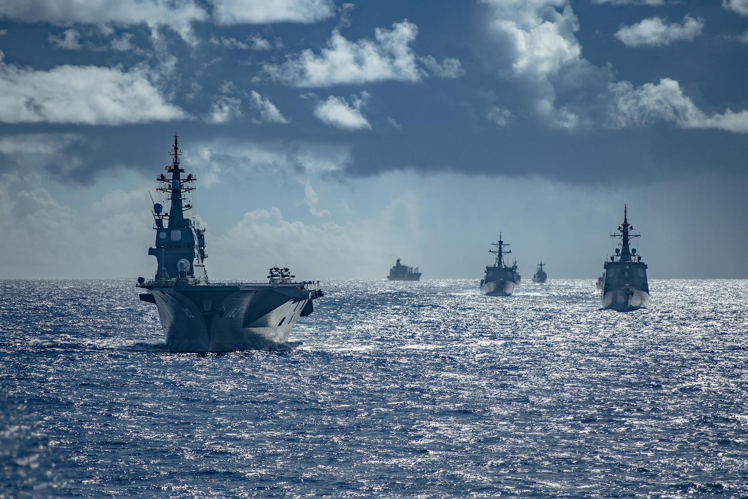 PACIFIC OCEAN (Sept. 11, 2020) – Royal Australian Navy, Republic of Korea Navy, Japan Maritime Self-Defense Force, and United States Navy warships sail in formation during the Pacific Vanguard 2020 exercise. Pacific Vanguard serves as an opportunity to exercise and improve multinational interoperability at all levels; to improve tactical proficiency; and to adapt to ever changing regional challenges. Arleigh Burke-class guided-missile destroyer USS Barry (DDG 52) is underway conducting operations in support of security and stability in the Indo-Pacific while assigned to Destroyer Squadron (DESRON) 15, the Navy’s largest forward-deployed DESRON and the U.S. 7th Fleet’s principal surface force.