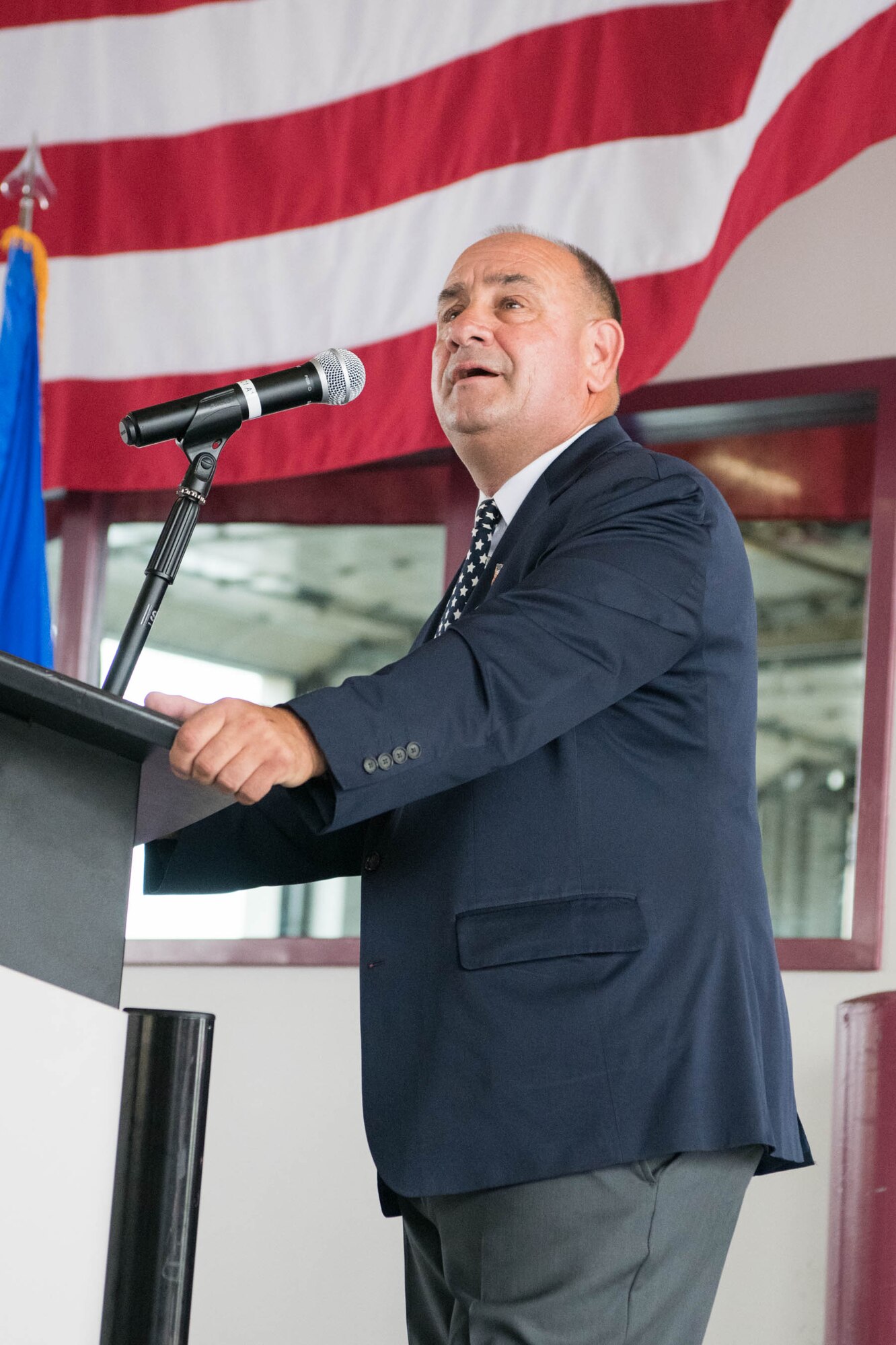 Jack Dunn speaks at the 19th Anniversary 9/11 memorial event Sept. 11, 2020, at the fire station on Dover AFB, Delaware. During his speech, Dunn recounted his whereabouts during the 9/11 attacks on New York City, New York, and his participation in the rescue and recovery efforts in the weeks following. (U.S. Air Force photo by Mauricio Campino)