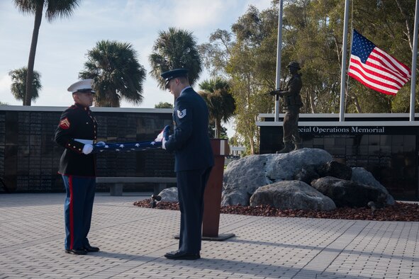 Members of the U.S. Special Operations Command Color Guard, perform a flag fold during a 9/11 Observance Ceremony Sept. 11, 2020, at MacDill Air Force Base, Fla.