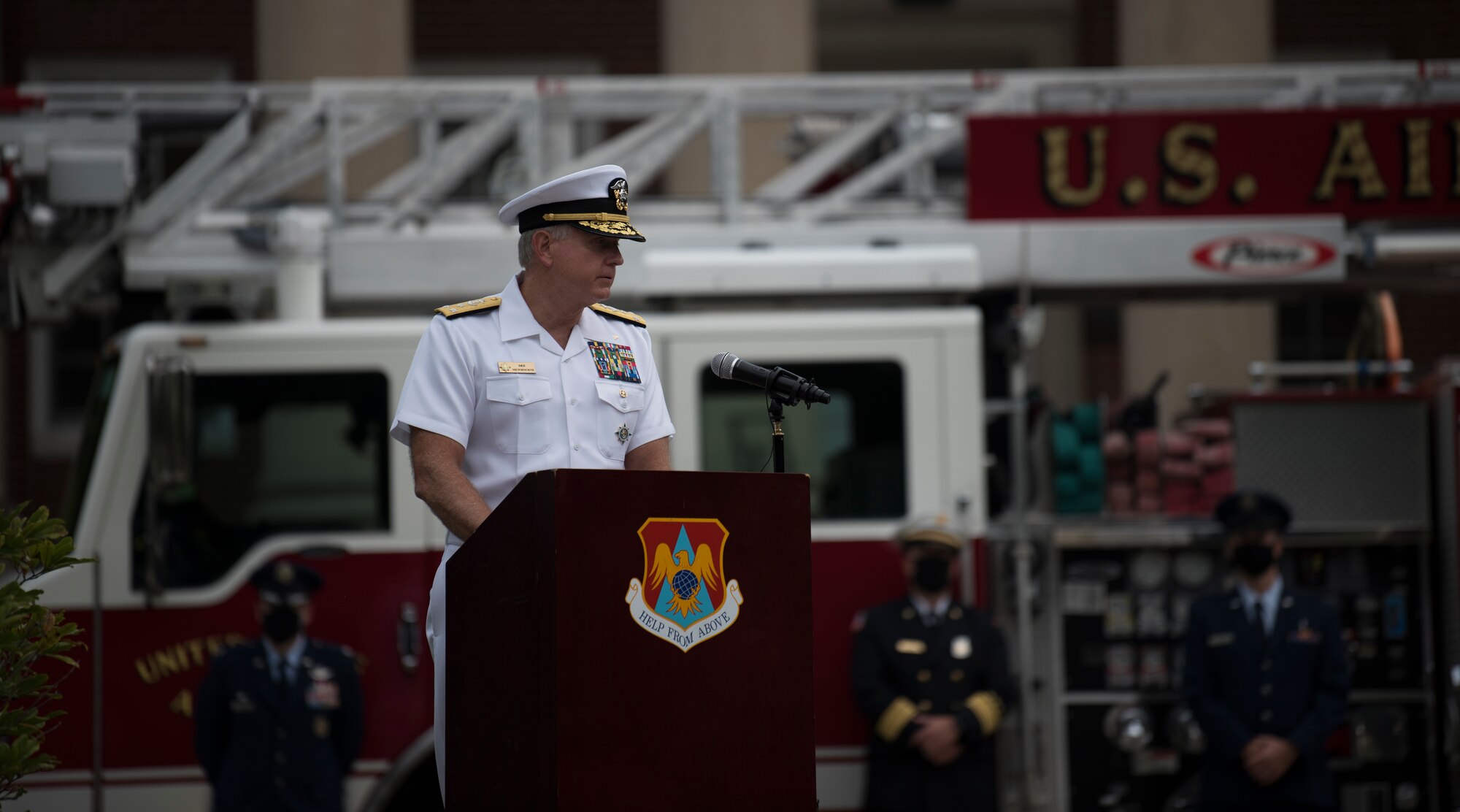 U.S. Navy Vice Admiral Dee L. Mewbourne, U.S. Transportation Command deputy commander, provides remarks