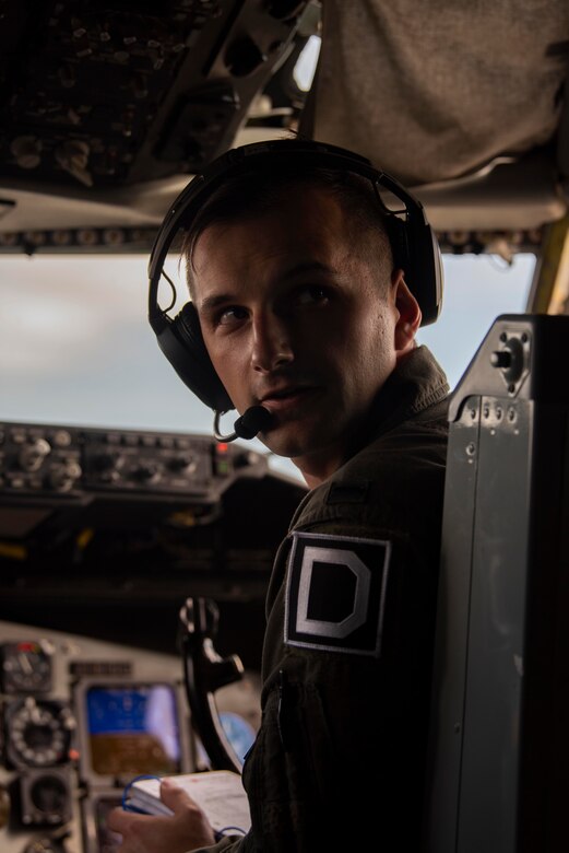 1st Lt. Michael Nall, 351st Air Refueling Squadron pilot, listens to an aircrew member during pre-flight checks at Royal Air Force Mildenhall, England, Sept. 10, 2020. The aircrew flew a mission as part of exercise Point Blank, which brought together U.S. Air Force, U.S. Marine Corp, Royal Air Force and Dutch aircraft to sharpen combat readiness over the North Sea. (U.S. Air Force photo by Airman 1st Class Joseph Barron)