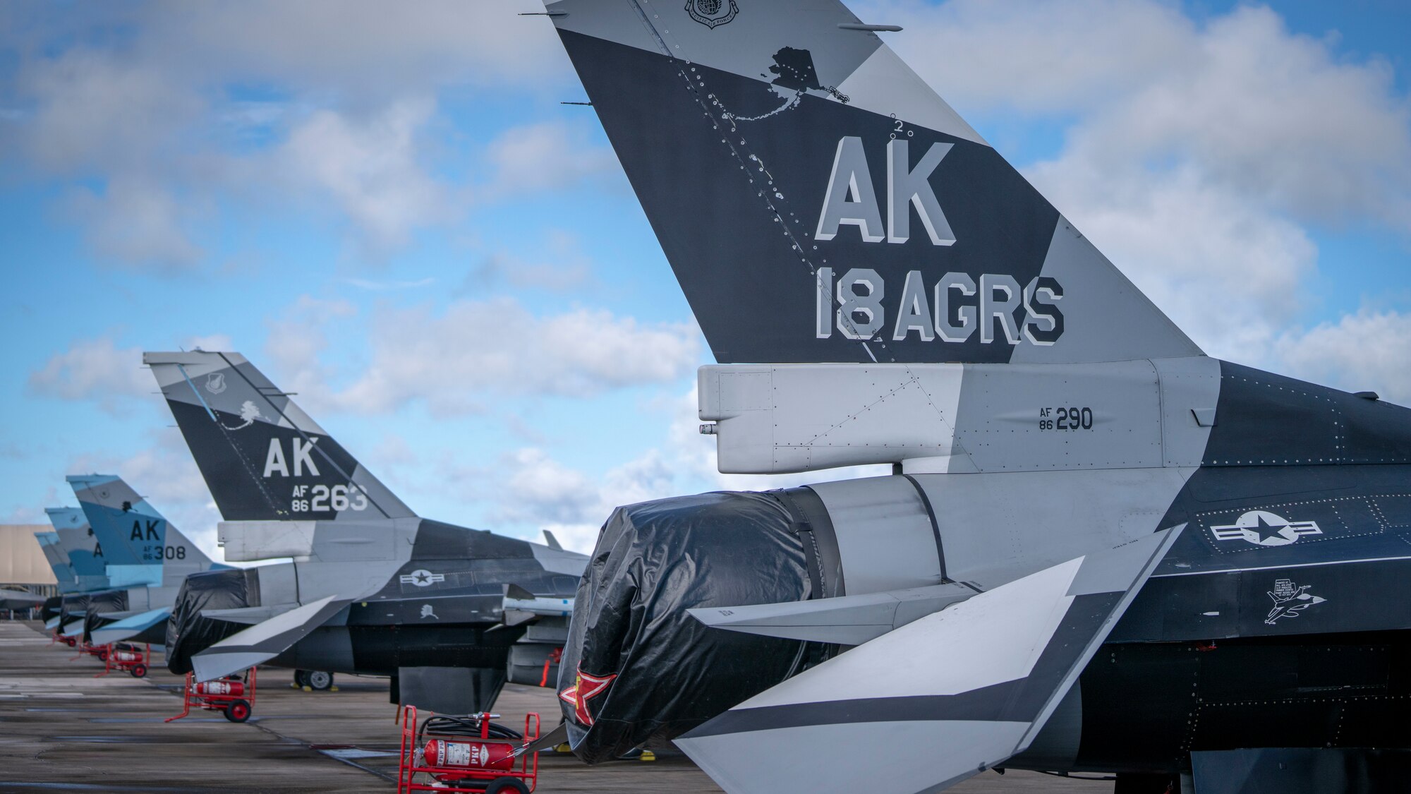 U.S. Air Force F-16 Fighting Falcons assigned to the 18th Aggressor Squadron, Eielson Air Force Base, Alaska, sit on the flightline in support of Valiant Shield 2020 at Andersen AFB, Guam, Sept. 11, 2020.