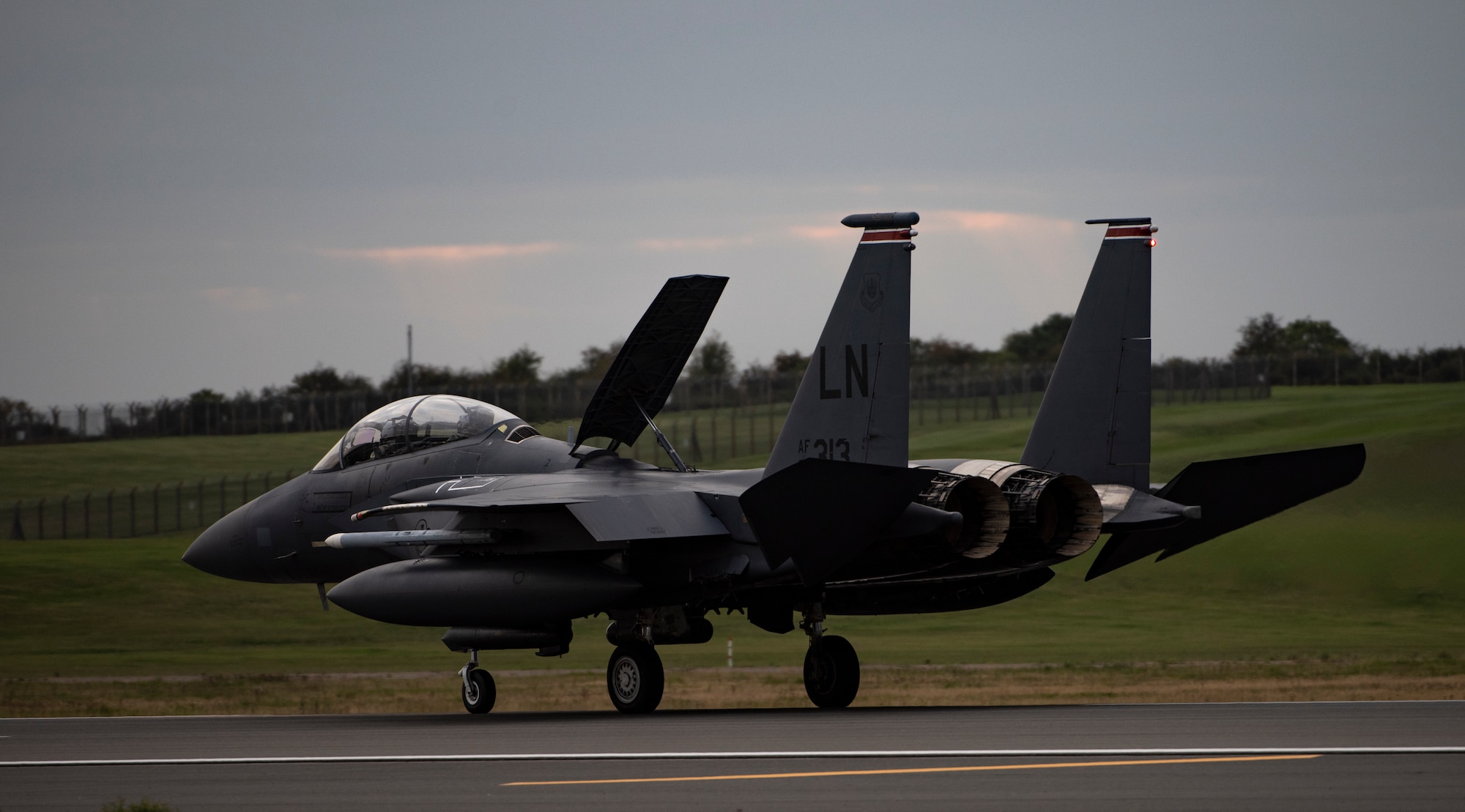 An F-15E Strike Eagle assigned to the 494th Fighter Squadron returns from a training sortie in support of exercise Point Blank 20-4 at Royal Air Force Lakenheath, England, Sept. 10, 2020.  Multilateral exercises like this increase interoperability and collective readiness with other NATO forces, deter potential adversaries and ensure the skies above the European theater remain sovereign. (U.S. Air Force photo by Airman 1st Class Jessi Monte)