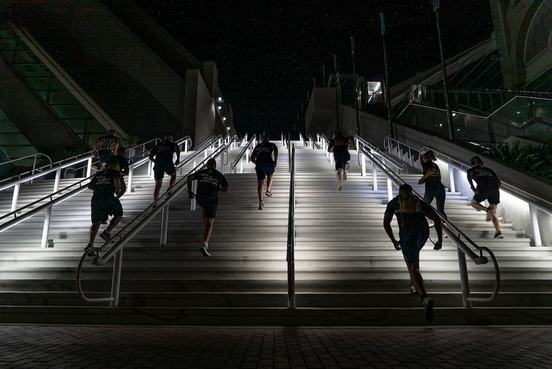 U.S. Marines run up stairs during a stair walk at the San Diego Convention Center, San Diego, Sept. 11.