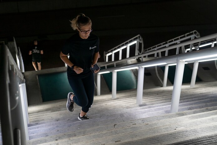 A U.S. Marine runs up a flight of stairs during stair walk at the San Diego Convention Center, San Diego, Sept. 11.