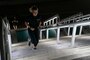 A U.S. Marine runs up a flight of stairs during stair walk at the San Diego Convention Center, San Diego, Sept. 11.