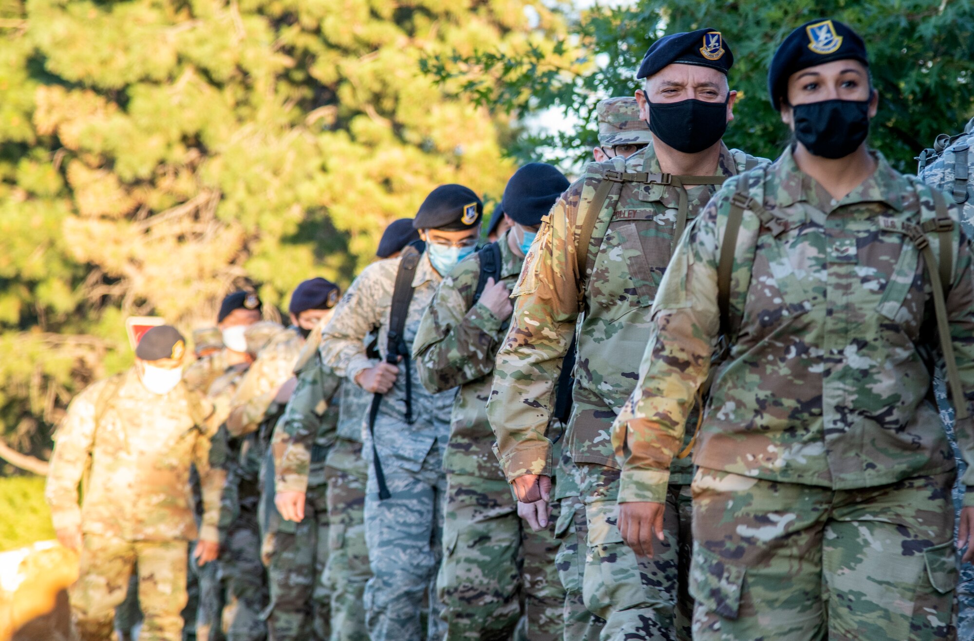 Members of the 302nd Security Forces Squadron set out on a Sunday morning ruck march at Peterson Air Force Base