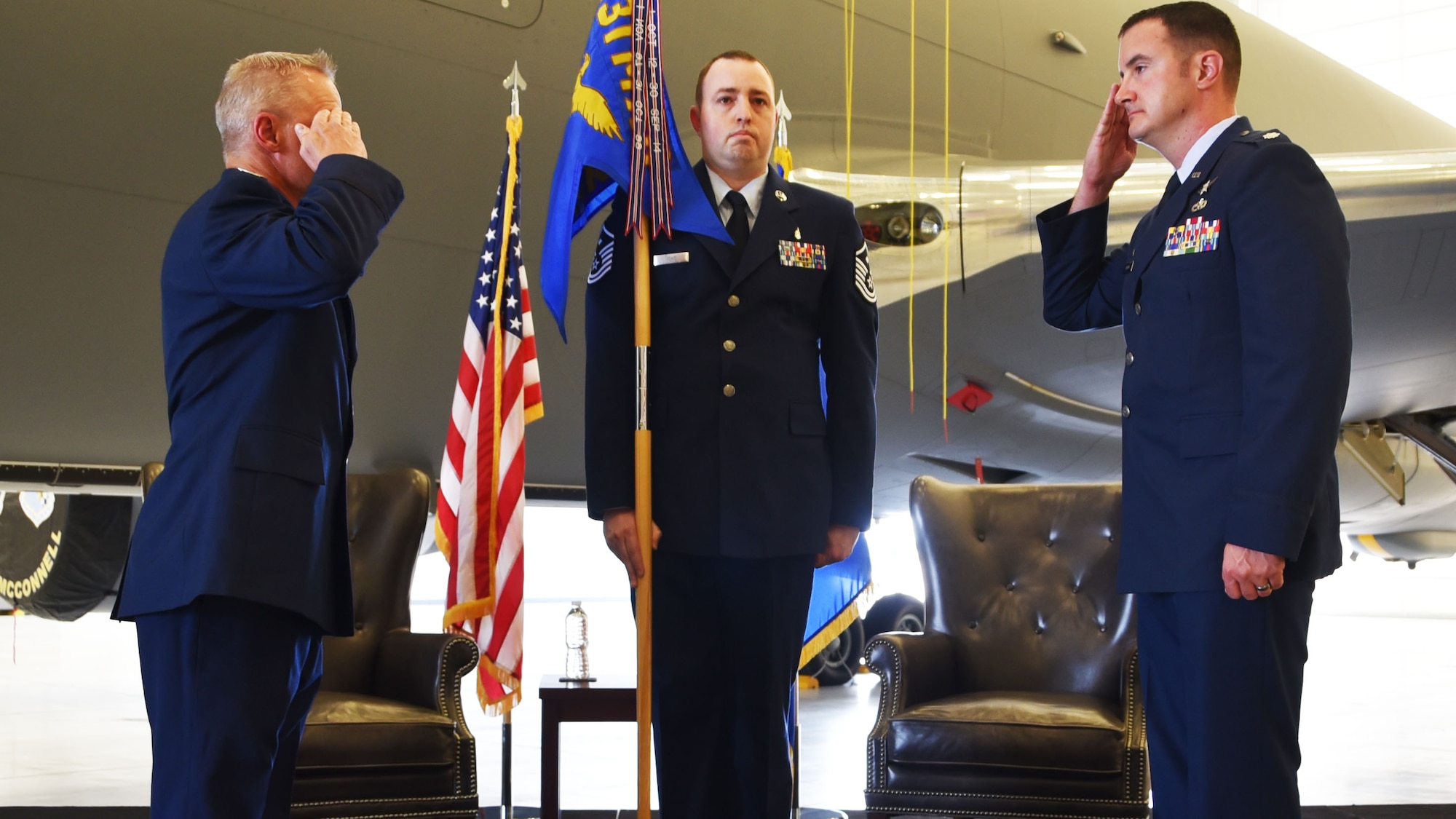 Col. Robert Thompson, 931st Maintenance Group commander (left), receives a salute from Lt. Col. Johnathan Jordan (right), signifying his assumption of command of the 931st Maintenance Squadron.  Jordan was originally scheduled to take command of the 931st MXS a year ago, but took on a nine-month deployment to Iraq