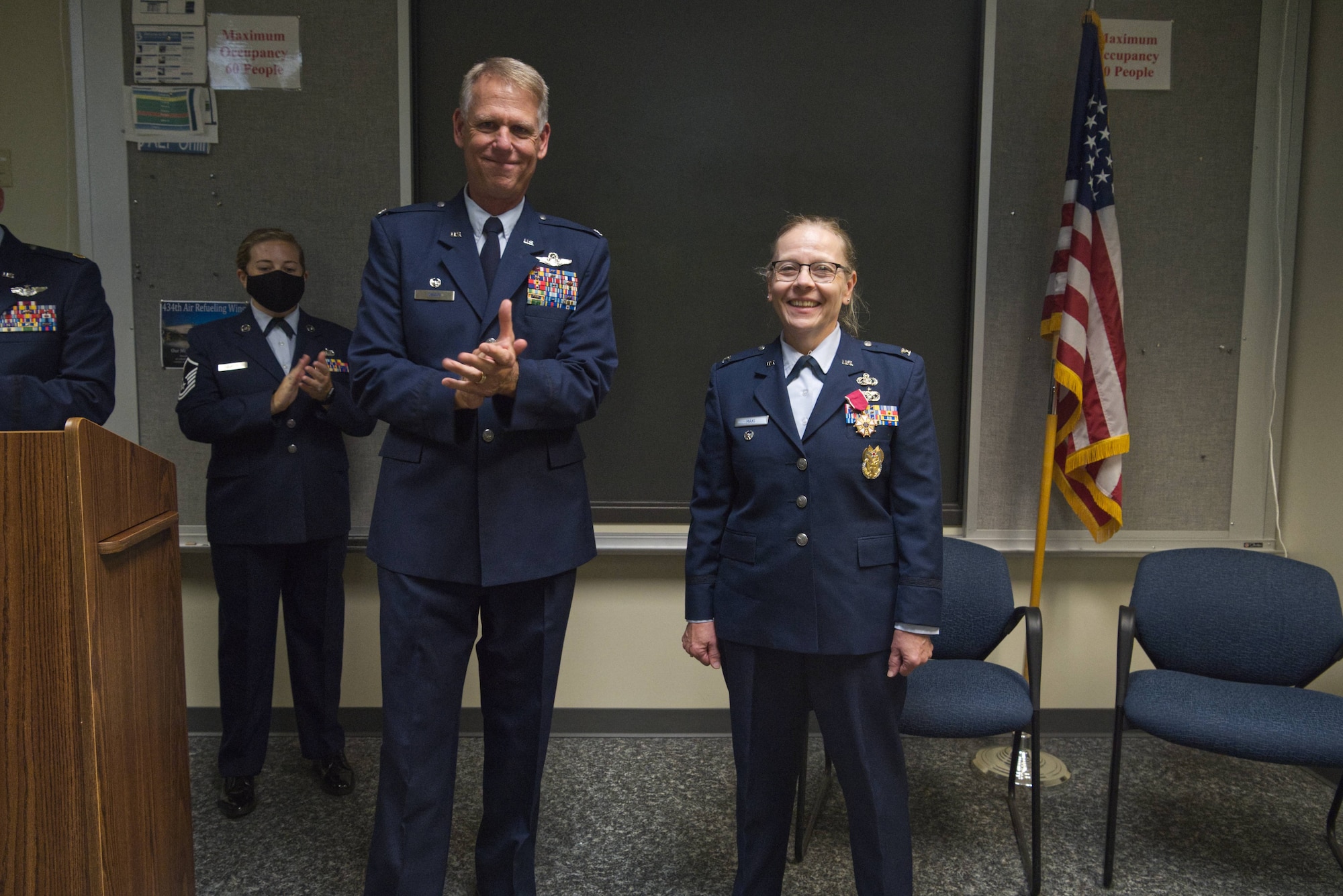 Col. Larry Shaw, 434th Air Refueling Wing commander, poses for a photo with Col. Susan Maki, 434th ARW inspector general, at her retirement ceremony at Grissom Air Reserve Base, Ind., Sept. 12, 2020. Maki retired after 32 years of service in the Minnesota Air Guard and Air Force Reserve. (U.S. Air Force Photo / A1C Harrison Withrow)