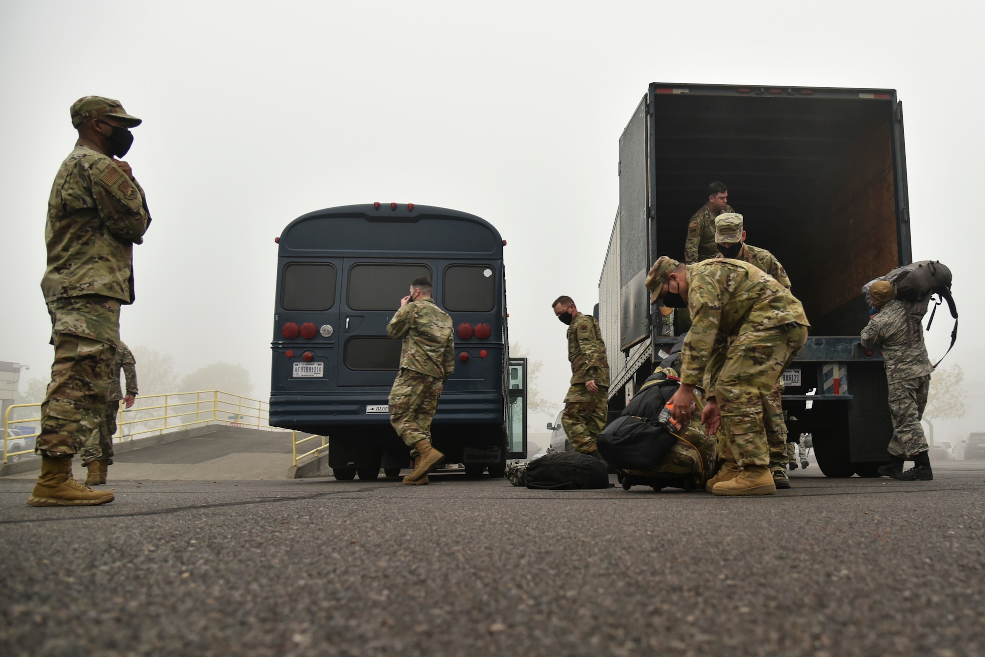 Oregon Air National Guard members from the 142nd Wing load their gear in a truck before leaving from the Portland Air National Guard Base, Portland, Ore., Sept. 13, 2020, to support Operation Plan Smokey. OPLAN Smokey is an interagency agreement between the Oregon Military Department and the Oregon Department of Forestry which tasks military members to assist with wildfire management. (U.S. Air National Guard photo by Senior Airman Valerie R. Seelye)