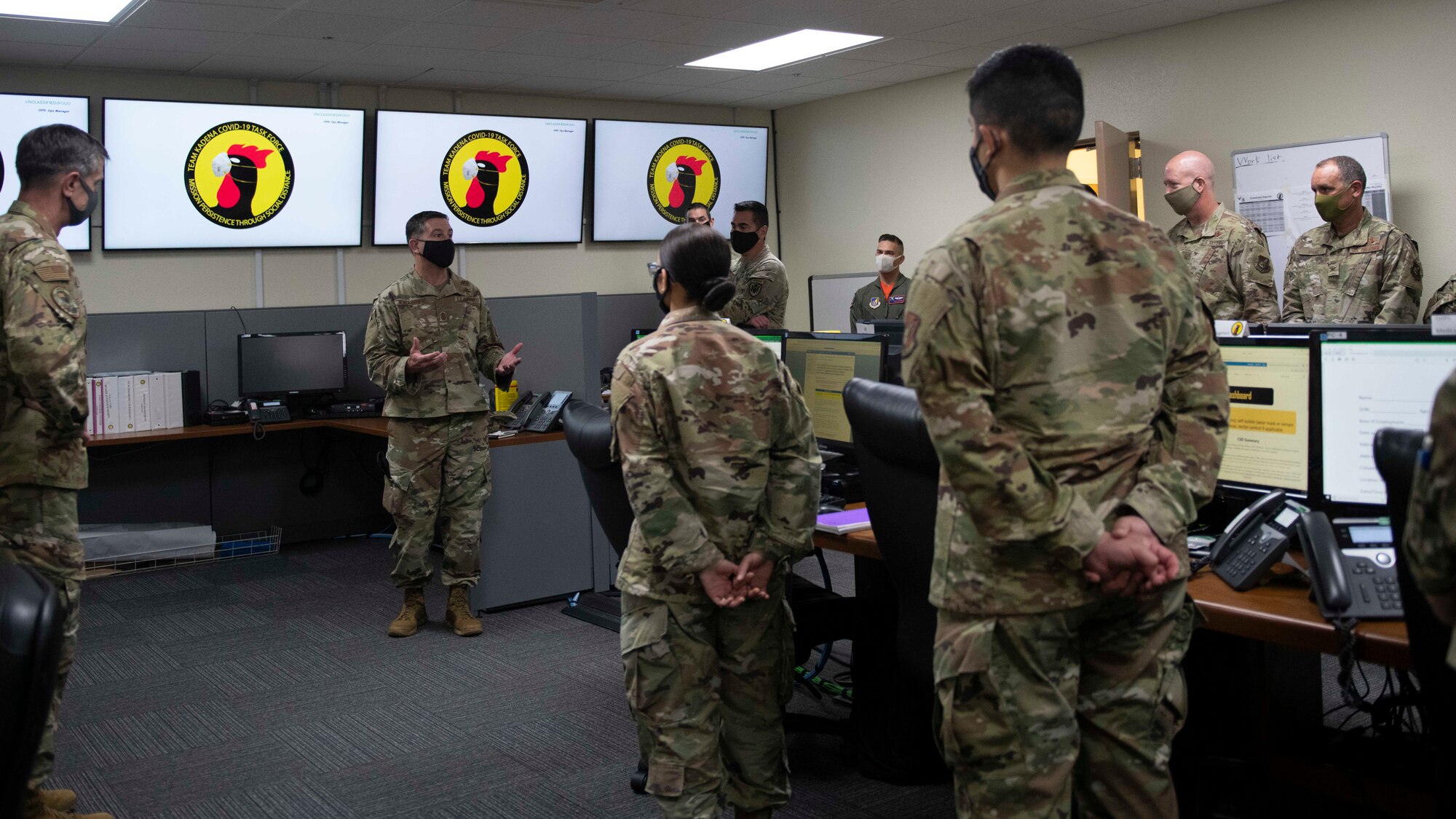 U.S. Air Force Chief Master Sgt. Rick Winegardner, U.S. Forces Japan senior enlisted leader, speaks with Airmen in the COVID-19 current operations center, Sept. 11, 2020, at Kadena Air Base, Japan. The visit by USFJ leaders enabled them to communicate headquarters strategies directly to Team Kadena as well as receive feedback and listen to Airmen’s concerns. USFJ leaders visited Team Kadena in order to discuss topics such as mission readiness and counter-COVID operations. (U.S. Air Force photo by Staff Sgt. Peter Reft)