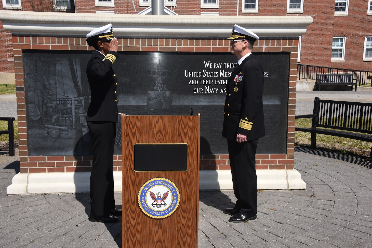 Navy Capt. Janice G. Smith salutes Rear Adm. Michael A. Wettlaufer, commander, Military Sealift Command, after she took command from Navy Capt. Hans E. Lynch as commander of Norfolk-based Military Sealift Command Atlantic during a change of command ceremony held at Naval Station Norfolk outside of MSC headquarters, March 19, 2020.