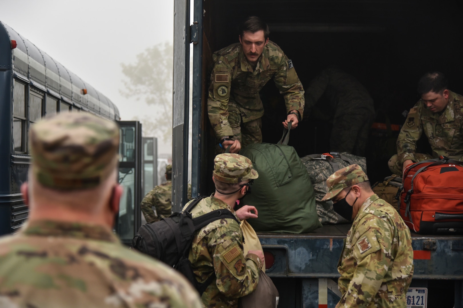 Oregon Air National Guard members from the 142nd Wing load gear in a truck before leaving from the Portland Air National Guard Base, Portland, Ore., Sept. 13, 2020. The Airmen departed to support Operation Plan Smokey, an interagency wildfire relief effort in the state.