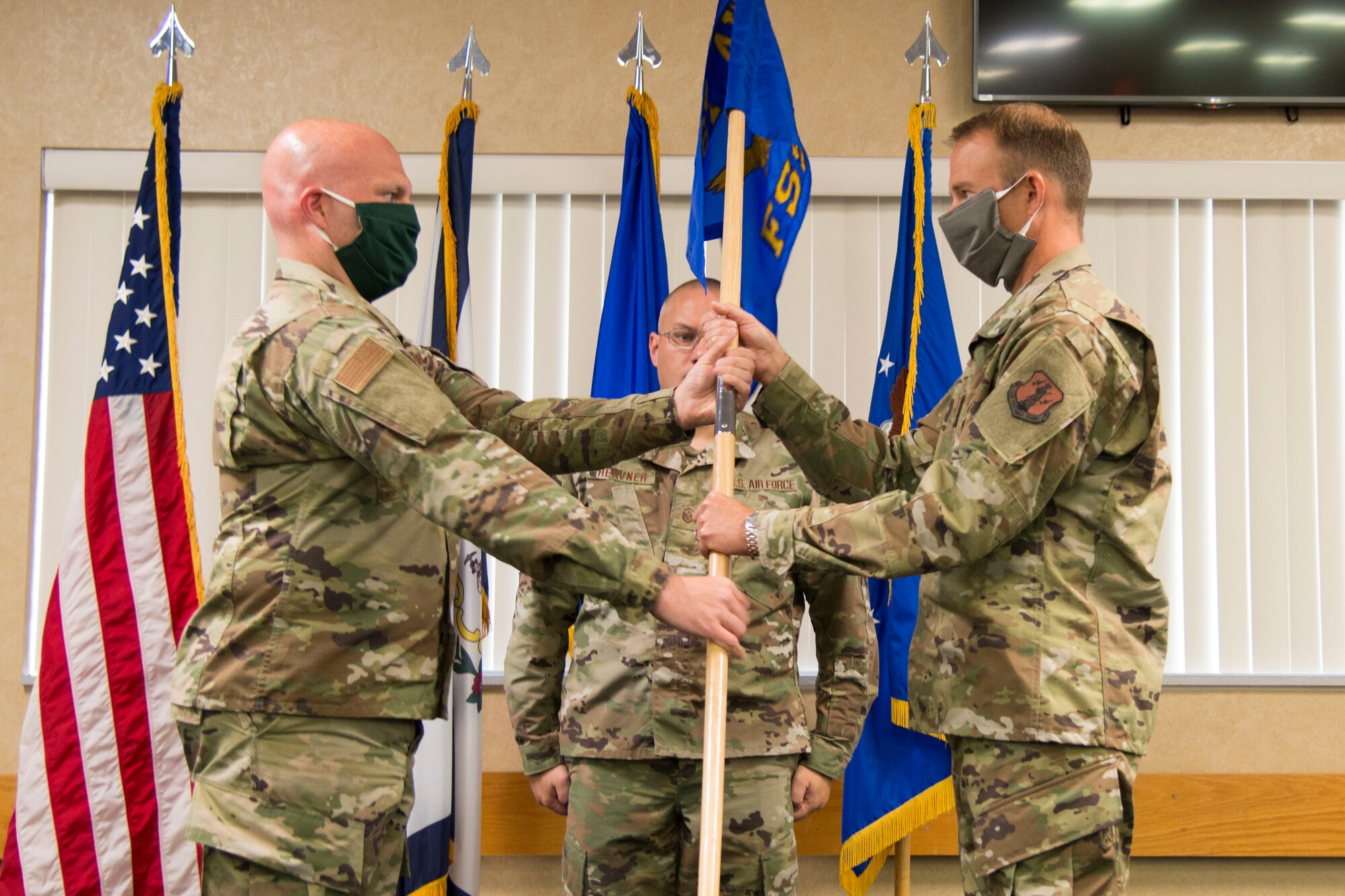 Col. Bill Annie relinquishes command of the 167th Force Support Squadron to Maj. Ben Mathias during a change of command ceremony at the 167th Airlift Wing, Sept. 12, 2020. Annie is now the 167th Mission Support Group commander. Mathias is a pilot for the 167th Airlift Wing, and previously served in the Inspector General's office.