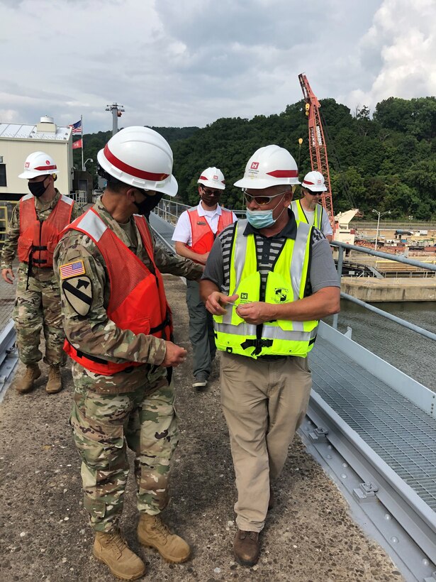 The Great Lakes and Ohio River Division Commander Maj. Gen. Robert F. Whittle Jr. presents Emsworth Locks & Dams personnel a Commanders Coin Sept. 1, 2020. A Commanders Coins are often presented to a service member or civilian for an excellent job well done, or for an award for doing something outstanding.