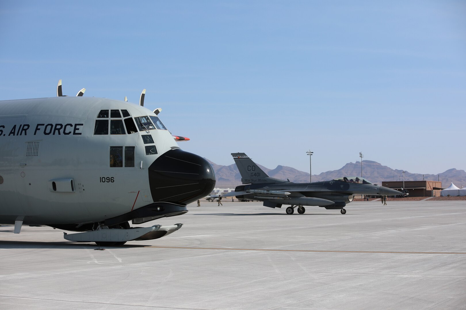 Elements of the 109th Airlift wing participate in a joint exercise at Nellis Air Force Base in Las Vegas demonstrating the capability to establish and land at an austere landing area, secured by the 321st Contingency Response Squadron, carrying ordinance for rearming F-16 fighter jets from the 140th fighter wing (Buckley AFB).