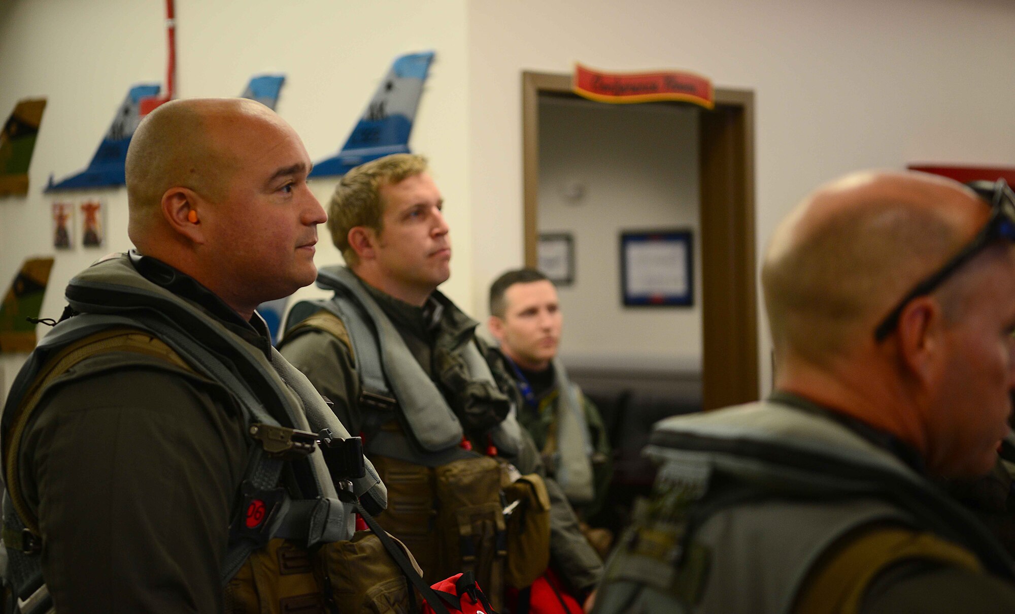 U.S. Air Force F-16 Fighting Falcon pilots, assigned to the 18th Aggressor Squadron, receive a pre-flight brief before departing to support exercise Valiant Shield on Eielson Air Force Base (AFB), Alaska, Sept. 8, 2020. The 18th AGRS will be participating in exercise Valiant Shield from Sept. 8-20 at Anderson AFB, Guam. Valiant Shield 20 provides an effective, flexible and capabilities centered force, enabling real-world proficiency in response to a variety of crises. (U.S. Air Force photo by Staff Sgt. Sean Martin)
