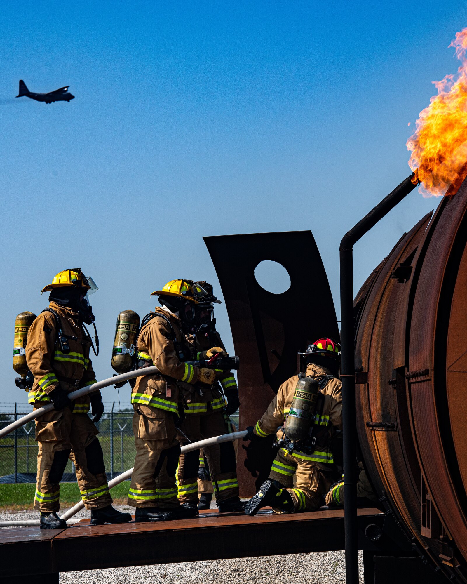 Firefighters from Rickenbacker Air National Guard breach Youngstown Air Reserve Station’s burn pit, Sept. 9, 2020. About 40 Citizen Airmen from RANG’s fire department came to the 910th Airlift Wing, Sept. 8-10, to do their annual live-fire training.