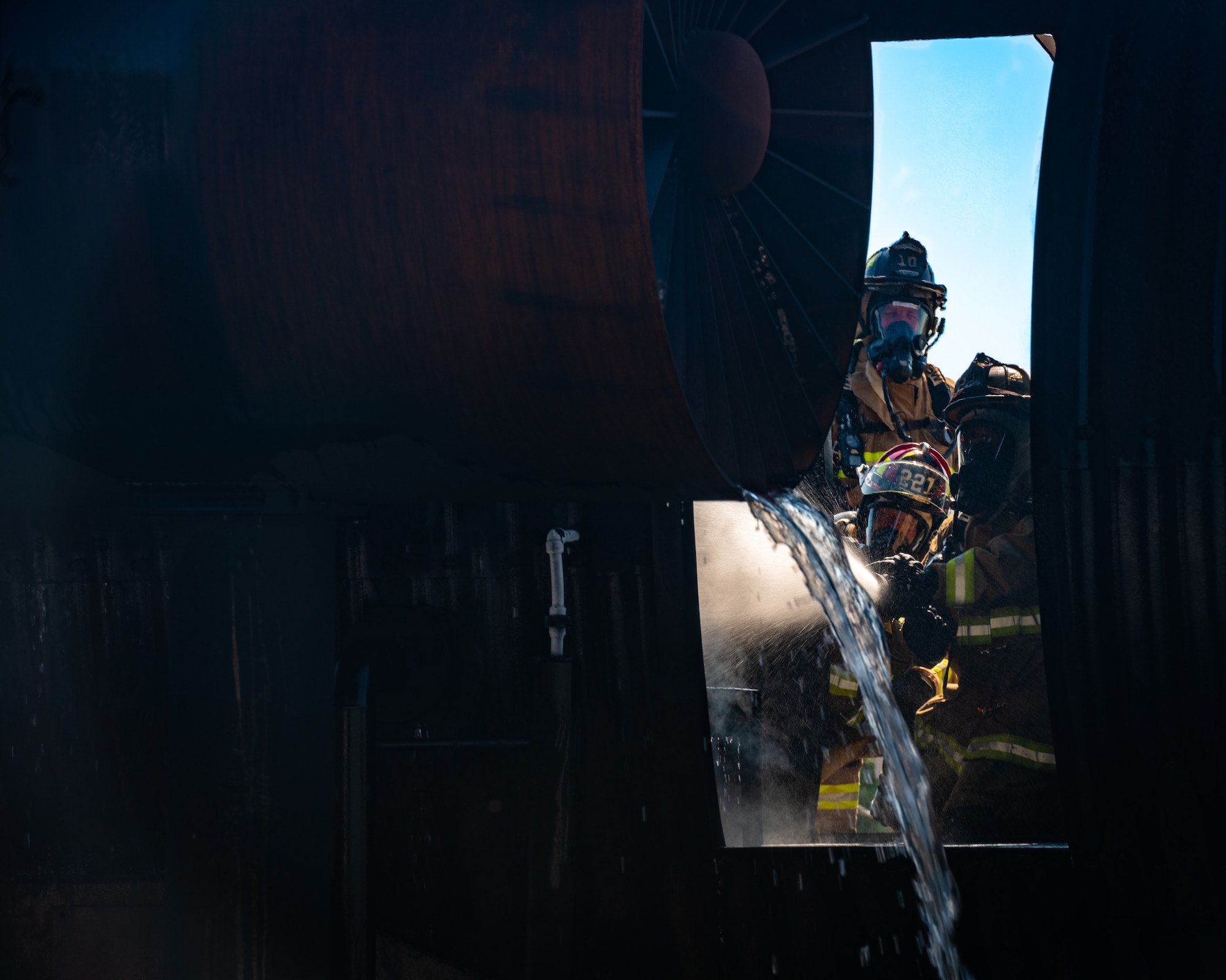 Firefighters from Rickenbacker Air National Guard extinguish an internal aircraft fire, Sept. 9, 2020, at Youngstown Air Reserve Station’s burn pit. About 40 Citizen Airmen from RANG’s fire department came to the 910th Airlift Wing, Sept. 8-10, to do their annual live-fire training.