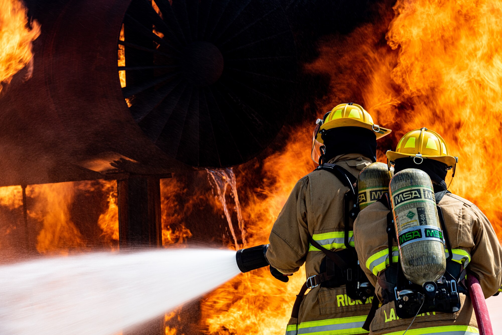 Firefighters from Rickenbacker Air National Guard fight an external aircraft fire, Sept. 9, 2020, at Youngstown Air Reserve Station’s burn pit. About 40 Citizen Airmen from RANG’s fire department came to the 910th Airlift Wing, Sept. 8-10, to do their annual live-fire training.
