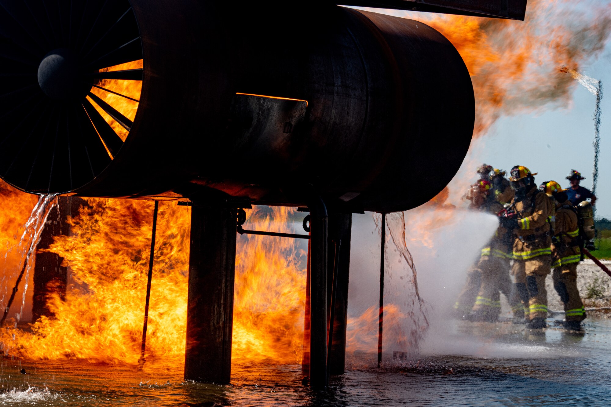 Firefighters from Rickenbacker Air National Guard fight an external aircraft fire, Sept. 9, 2020, at Youngstown Air Reserve Station’s burn pit. About 40 Citizen Airmen from RANG’s fire department came to the 910th Airlift Wing, Sept. 8-10, to do their annual live-fire training.