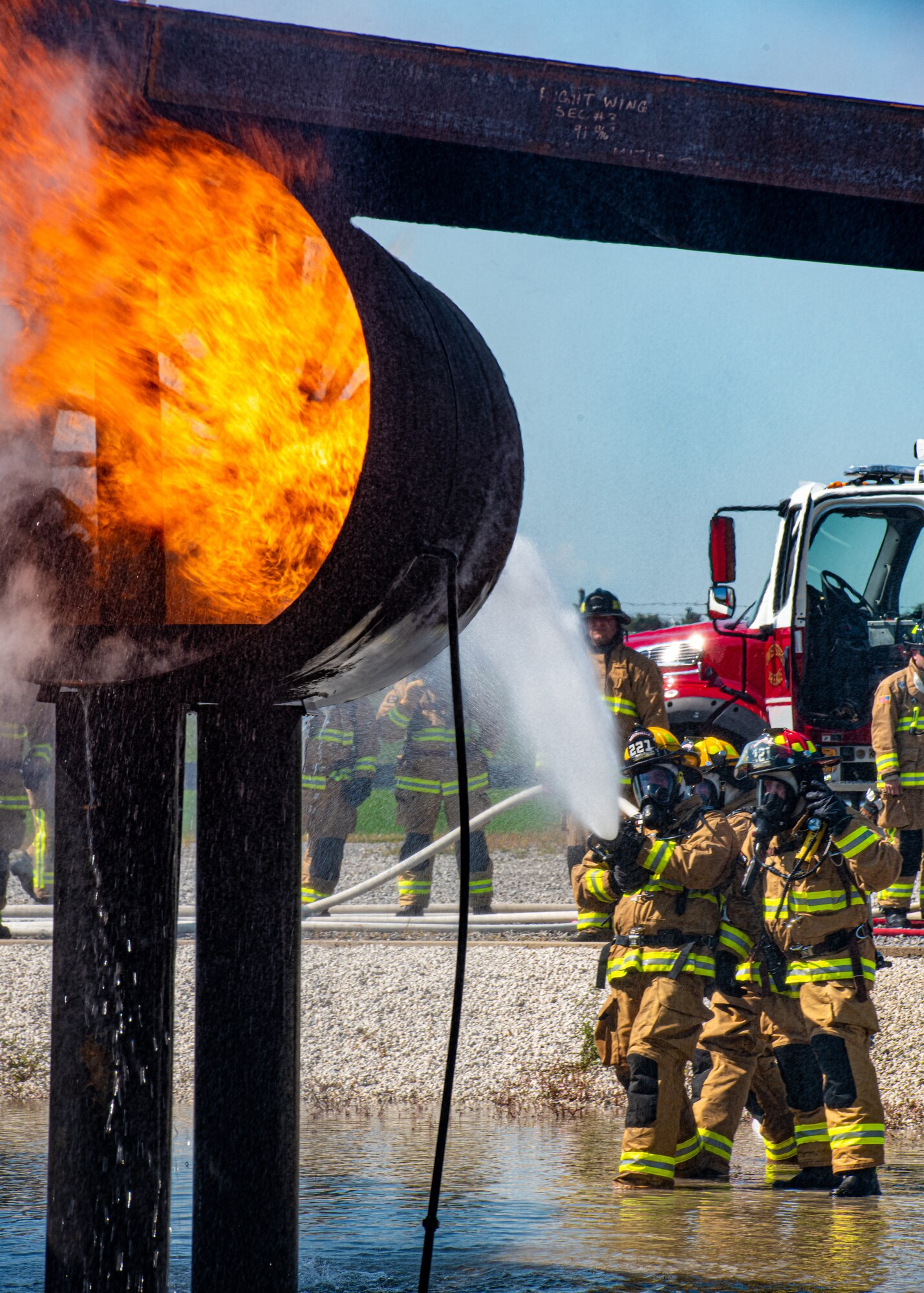Firefighters from Rickenbacker Air National Guard fight an external aircraft fire, Sept. 9, 2020, at Youngstown Air Reserve Station’s burn pit. About 40 Citizen Airmen from RANG’s fire department came to the 910th Airlift Wing, Sept. 8-10, to do their annual live-fire training.